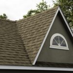 Durable roof covered shingles on house rooftop