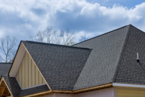 Asphalt shingle roofing on a suburban home