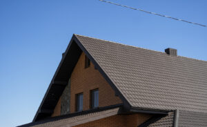 Brown roof on a tan suburban home