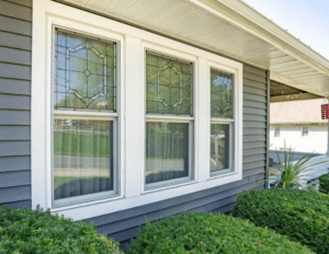 Exterior of double-hung windows on a one-story home